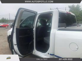 2015 RAM 1500 QUAD CAB PICKUP WHITE AUTOMATIC - Auto Spot