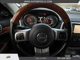2012 JEEP GRAND CHEROKEE SUV BLACK AUTOMATIC - Auto Spot