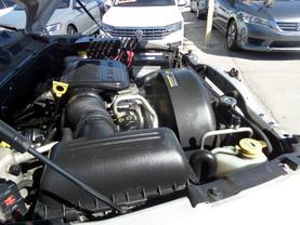2005 DODGE DAKOTA QUAD CAB PICKUP V8, 4.7 LITER ST PICKUP 4D 5 1/2 FT at Gael Auto Sales in El Paso, TX