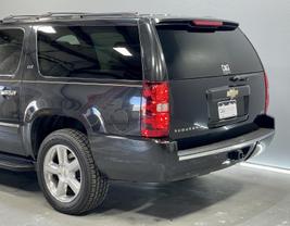 2011 CHEVROLET SUBURBAN 1500 SUV BLACK AUTOMATIC - Discovery Auto Group