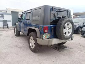 2010 JEEP WRANGLER SUV V6, 3.8 LITER UNLIMITED SAHARA SPORT UTILITY 4D at YID Auto Sales in Hollywood, FL   25.997523502292495, -80.14913739060177