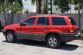 1999 JEEP GRAND CHEROKEE SUV RED AUTOMATIC - The Auto Superstore, INC
