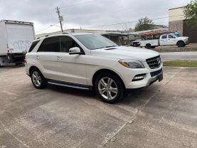 2015 MERCEDES-BENZ M-CLASS SUV V6, 3.5 LITER ML 350 SPORT UTILITY 4D at Motors On Wheels - used car dealership in Houston, Texas.