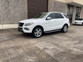 2015 MERCEDES-BENZ M-CLASS SUV V6, 3.5 LITER ML 350 SPORT UTILITY 4D at Motors On Wheels - used car dealership in Houston, Texas.