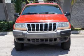 1999 JEEP GRAND CHEROKEE SUV RED AUTOMATIC - The Auto Superstore, INC