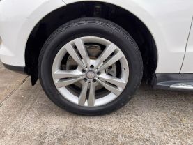 2015 MERCEDES-BENZ M-CLASS SUV V6, 3.5 LITER ML 350 SPORT UTILITY 4D at Motors On Wheels - used car dealership in Houston, Texas.