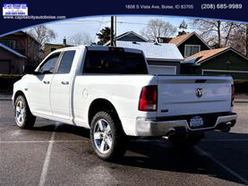2015 RAM 1500 QUAD CAB PICKUP BRIGHT WHITE CLEARCOAT AUTOMATIC - Capital City Auto