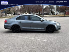 2014 VOLKSWAGEN JETTA SEDAN PLATINUM GRAY METALLIC AUTOMATIC - Capital City Auto
