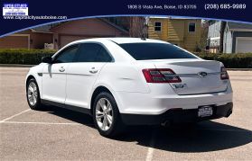 2014 FORD TAURUS SEDAN WHITE AUTOMATIC - Capital City Auto