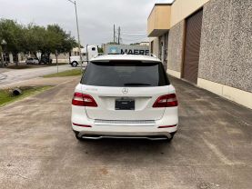 2015 MERCEDES-BENZ M-CLASS SUV V6, 3.5 LITER ML 350 SPORT UTILITY 4D at Motors On Wheels - used car dealership in Houston, Texas.