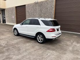 2015 MERCEDES-BENZ M-CLASS SUV V6, 3.5 LITER ML 350 SPORT UTILITY 4D at Motors On Wheels - used car dealership in Houston, Texas.