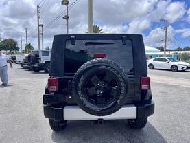 2010 JEEP WRANGLER SUV BLACK CLEARCOAT AUTOMATIC - Tropical Auto Sales