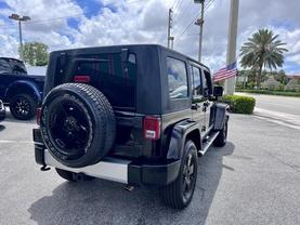 2010 JEEP WRANGLER SUV BLACK CLEARCOAT AUTOMATIC - Tropical Auto Sales