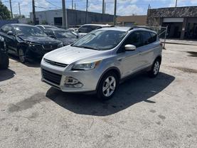 2014 FORD ESCAPE SUV 4-CYL, ECOBOOST, 1.6L SE SPORT UTILITY 4D at YID Auto Sales in Hollywood, FL   25.997523502292495, -80.14913739060177
