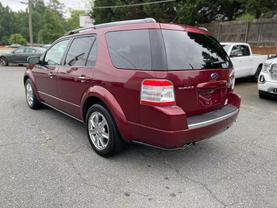 2008 FORD TAURUS X SUV RED AUTOMATIC - Xtreme Auto Sales