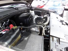 2014 CHEVROLET SUBURBAN 1500 SUV V8, FLEX FUEL, 5.3 LITER LT SPORT UTILITY 4D at Gael Auto Sales in El Paso, TX