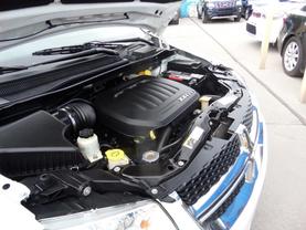 2016 DODGE GRAND CARAVAN PASSENGER PASSENGER V6, FLEX FUEL, 3.6 LITER SXT MINIVAN 4D at Gael Auto Sales in El Paso, TX