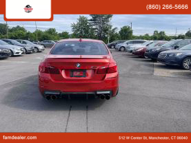 2014 BMW M5 SEDAN ORANGE AUTOMATIC - Faris Auto Mall