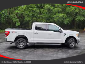 Used 2021 FORD F150 SUPERCREW CAB PICKUP V6, ECOBOOST, TWIN TURBO, 3.5 LITER LARIAT PICKUP 4D 5 1/2 FT - Mobile Luxury Motors located in Mobile, AL