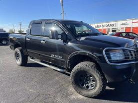 Used 2014 NISSAN TITAN CREW CAB for $15,350 at Big Mikes Auto Sale in Tulsa, OK 36.0895488,-95.8606504