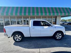 2017 RAM 1500 QUAD CAB PICKUP BRIGHT WHITE CLEARCOAT AUTOMATIC - Tropical Auto Sales
