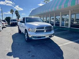 2017 RAM 1500 QUAD CAB PICKUP BRIGHT WHITE CLEARCOAT AUTOMATIC - Tropical Auto Sales