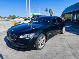 2014 BMW 7 SERIES SEDAN BLACK SAPPHIRE METALLIC AUTOMATIC - Tropical Auto Sales