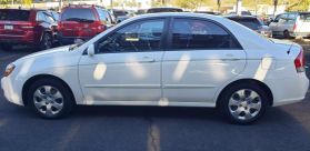 2009 KIA SPECTRA SEDAN 4-CYL, 2.0 LITER EX SEDAN 4D at The one Auto Sales in Phoenix, AZ