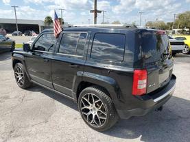 2014 JEEP PATRIOT SUV 4-CYL, 2.4 LITER LIMITED SPORT UTILITY 4D at World Car Center & Financing LLC in Kissimmee, FL