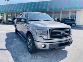 2014 FORD F150 SUPERCREW CAB PICKUP STERLING GRAY METALLIC AUTOMATIC - Tropical Auto Sales