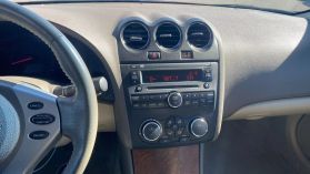 2009 NISSAN ALTIMA SEDAN RED MANUAL - Auto Spot