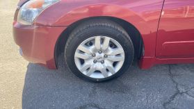 2009 NISSAN ALTIMA SEDAN RED MANUAL - Auto Spot