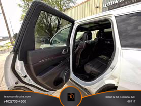 2014 JEEP GRAND CHEROKEE SUV V8, 5.7 LITER SUMMIT SPORT UTILITY 4D at T's Auto & Truck Sales - used car dealership in Omaha, NE