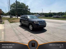 2011 JEEP GRAND CHEROKEE SUV V8, 5.7 LITER LAREDO SPORT UTILITY 4D at T's Auto & Truck Sales - used car dealership in Omaha, NE