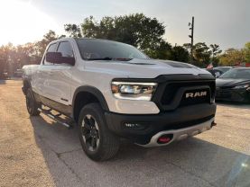 2019 RAM 1500 QUAD CAB PICKUP WHITE AUTOMATIC -  V & B Auto Sales