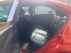 2012 CHEVROLET SONIC SEDAN ORANGE AUTOMATIC - Auto Spot