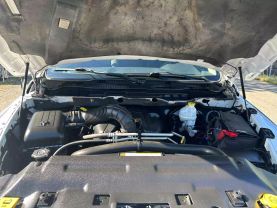 2012 RAM 1500 QUAD CAB PICKUP WHITE AUTOMATIC - Auto Spot