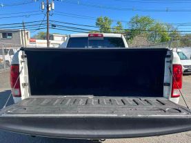 2012 RAM 1500 QUAD CAB PICKUP WHITE AUTOMATIC - Auto Spot