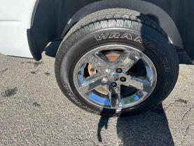 2012 RAM 1500 QUAD CAB PICKUP WHITE AUTOMATIC - Auto Spot