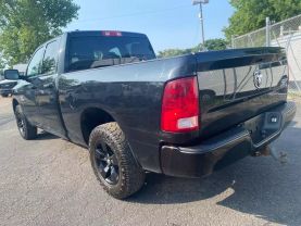 2016 RAM 1500 QUAD CAB PICKUP BLACK AUTOMATIC - Auto Spot