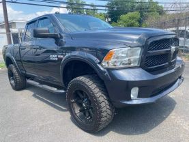 2014 RAM 1500 QUAD CAB PICKUP BLACK AUTOMATIC - Auto Spot
