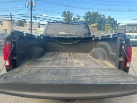 2015 RAM 1500 QUAD CAB PICKUP BLACK AUTOMATIC - Auto Spot