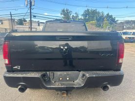 2015 RAM 1500 QUAD CAB PICKUP BLACK AUTOMATIC - Auto Spot