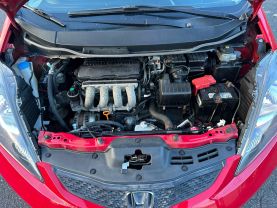 2010 HONDA FIT HATCHBACK RED MANUAL - Auto Spot