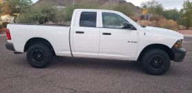 2010 DODGE RAM 1500 QUAD CAB PICKUP V8, FLEX FUEL, 4.7 LITER ST PICKUP 4D 6 1/3 FT at The One Autosales Inc in Phoenix , AZ 85022  33.60461470880989, -112.03641575767358