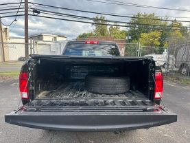 2018 RAM 1500 QUAD CAB PICKUP BLACK AUTOMATIC - Auto Spot