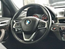 2018 BMW X1 SUV 4-CYL, TURBO, 2.0 LITER SDRIVE28I SPORT UTILITY 4D