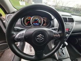 2010 SUZUKI GRAND VITARA SUV 4-CYL, 2.4 LITER PREMIUM SPORT UTILITY 4D