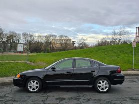 2004 PONTIAC GRAND AM SEDAN V6, 3.4 LITER SE SEDAN 4D