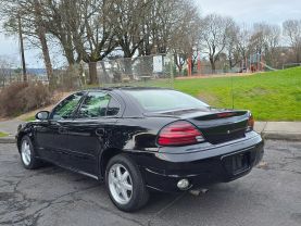 2004 PONTIAC GRAND AM SEDAN V6, 3.4 LITER SE SEDAN 4D